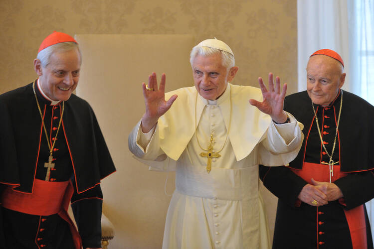 Pope Benedict XVI is flanked by Cardinal Donald W. Wuerl of Washington, left, and Cardinal Theodore E. McCarrick, retired archbishop of Washington, during a Jan. 19 meeting with U.S. bishops on their “ad limina” visits to the Vatican. In a speech to the bishops, the pope issued a strong warning about threats to freedom of religion and conscience in the U.S. (CNS photo/L’Osservatore Romano) (Jan. 19, 2012)