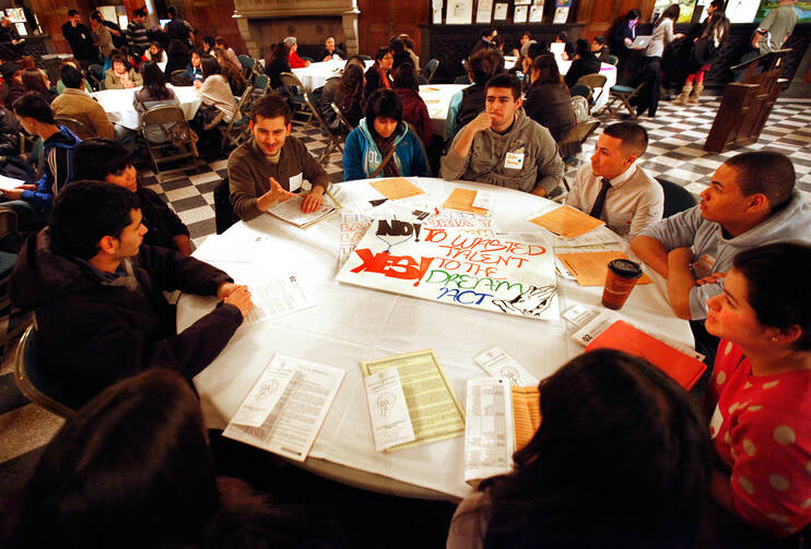 Students take part in a meeting about the DREAM Act during a National Migration Week program. (CNS photo/Karen Callaway, Catholic New World)