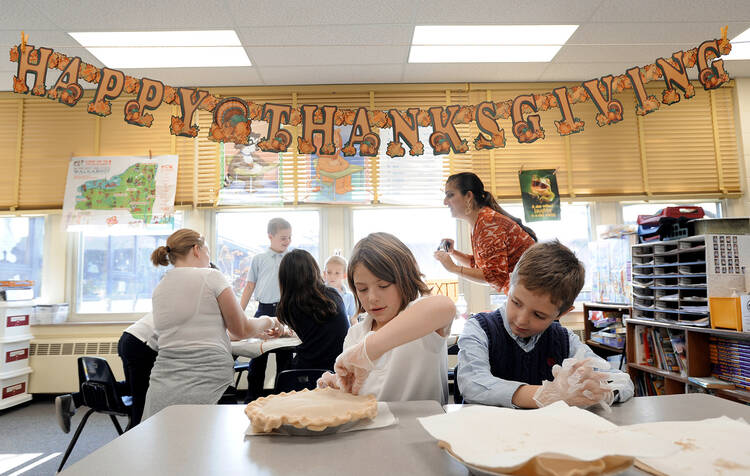 Second-grade students at St. Joseph School in Penfield, N.Y. make pies for a local soup kitchen (CNS photo/Mike Crupi, Catholic Courier)