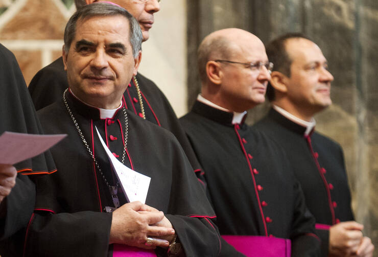 Archbishop Angelo Becciu, left (CNS photo/Alessia Giuliani, Catholic Press Photo)