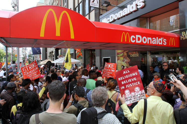 Fast-food workers and supporters demand higher wages during rally in New York (CNS photo/Gregory A. Shemitz)