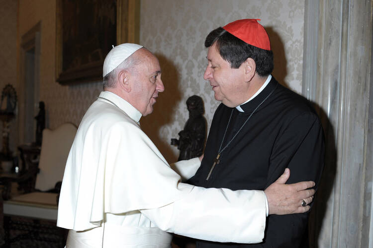 Pope Francis greets Brazilian Cardinal Aviz during private audience at Vatican. (CNS photo/L'Osservatore Romano via Reuters) 