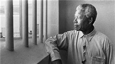 Nelson Mandela (1918-2013), a free man who inhabited a prison cell