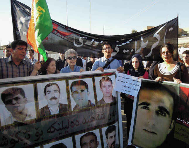 Maryknoll nun joins protest in Iraq over Iran government's execution of Kurds. (CNS photo/Marcus Armstrong, courtesy Christian Peacemaker Teams)