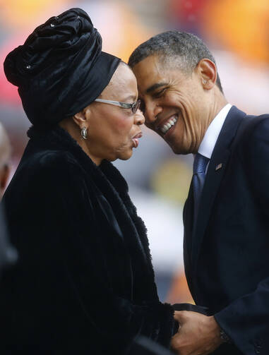 U.S. President Obama pays respects to Graca Machel at memorial service for her late husband, Nelson Mandela (CNS photo/Kai Pfaffenbach, Reuters) 