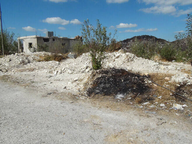 Site of mass grave in the Sleibeh al-Hamboushieh hamlet