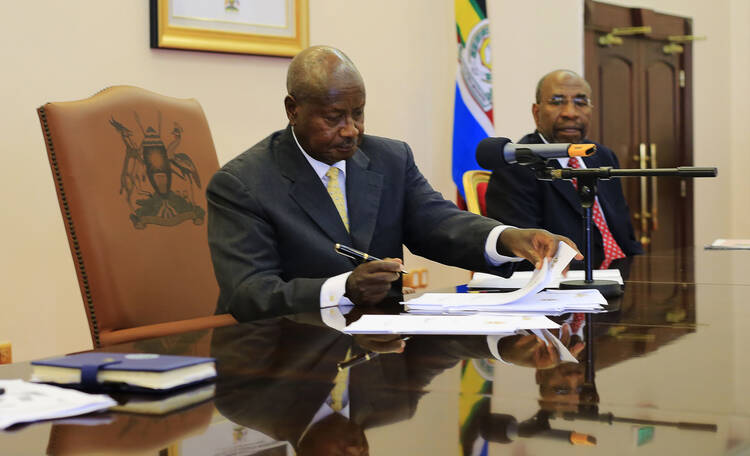 Uganda President Yoweri Museveni signed an anti-homosexuality bill into law in Entebbe on Feb. 24, 2014. (CNS photo/James Akena, Reuters)