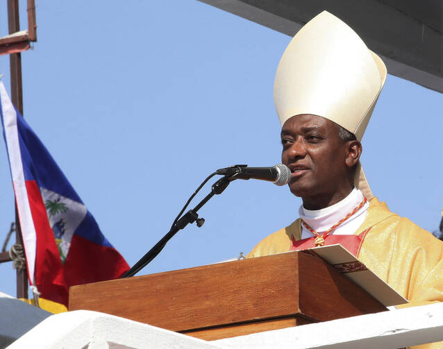 Cardinal Chibly Langlois of Les Cayes, Haiti, celebrates Mass at Sylvio Cator stadium in Port-au-Prince. (CNS photo/Marie Arago,Reuters)