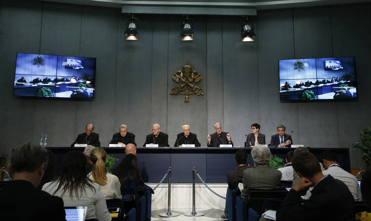 Vatican spokesman speaks during press conference for release of working document for extraordinary Synod of Bishops on family. (CNS photo/Paul Haring)