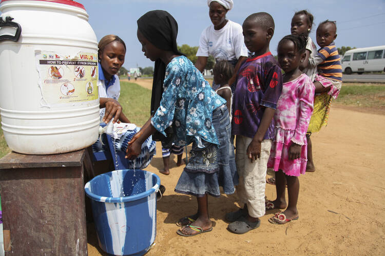 Children encouraged to wash hands at Ebola sensitization program in Liberia. 