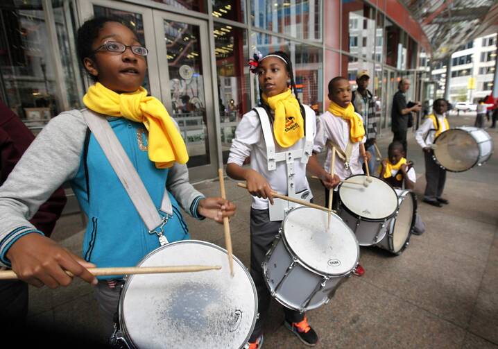 Members of Chicago's St. Malachy School drum corps play during a rally for school choice outside an Illinois state building in Chicago in September 2014. (CNS photo/Karen Callaway, Catholic New World)