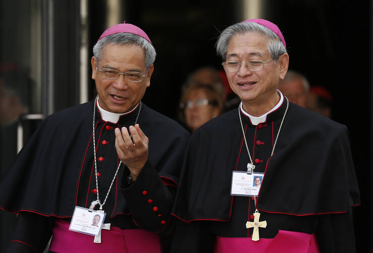 Archbishops John Hung Shan-Chuan of Taipei, Taiwan, and John Ha Tiong Hock of Kuching, Malaysia. (CNS photo/Paul Haring)