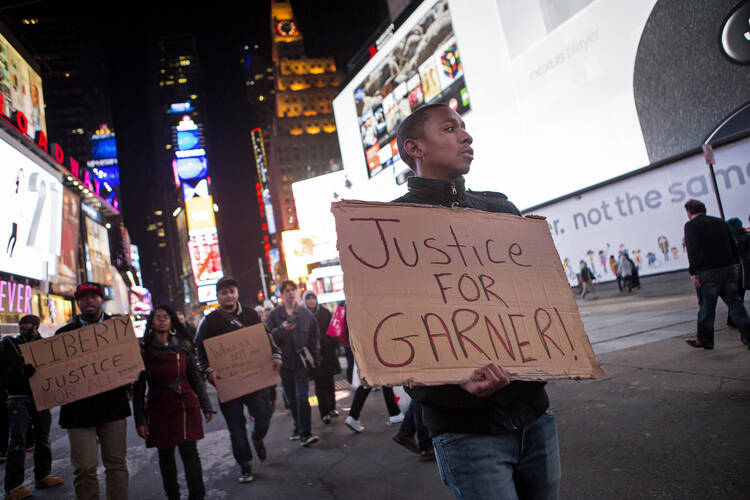People protest death of Eric Garner in Manhattan borough of New York
