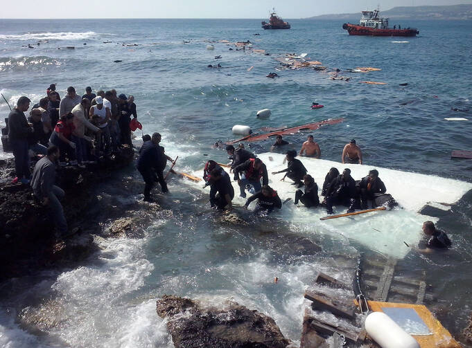 Migrants arrive at Zefyros beach near the coast of the southeastern island of Rhodes, Greece, April 20, 2015. At least three people drowned the day after Pope Francis appealed for the international community to do more to prevent such migrant deaths. (CNS photo/Loukas Mastis, EPA)