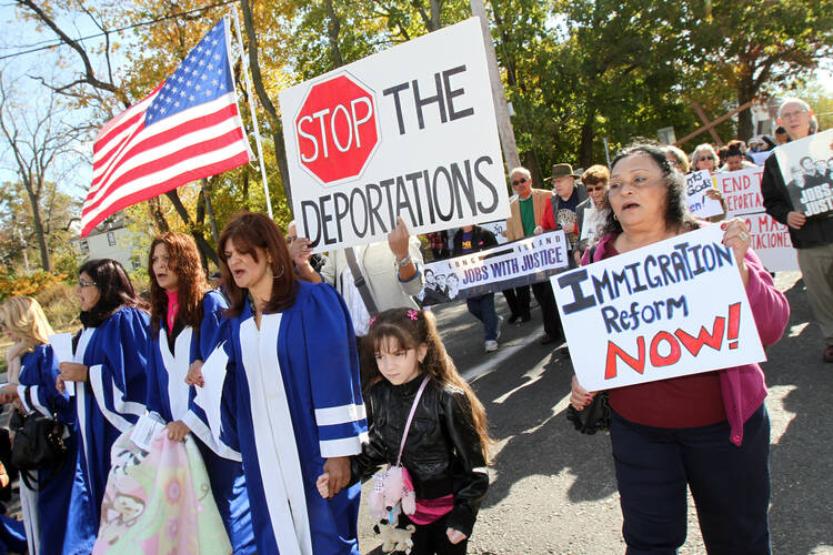 An interfaith march in 2013 in Wyandanch, N.Y., calls for immigration reform. (CNS photo/Gregory A. Shemitz)