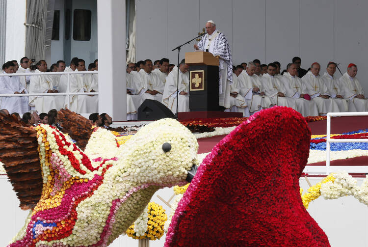 Pope Francis gives the homily as he celebrates Mass in Bicentennial Park in Quito, Ecuador, July 7. (CNS photo/Paul Haring) 