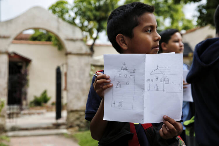 Students tour San Gabriel Mission in early May in San Gabriel, Calif. The fourth-grade California history curriculum looks at the social, political, cultural and economic life of the mission period. (CNS photo/Nancy Wiechec) 