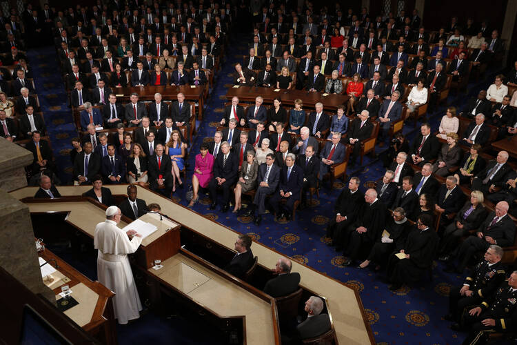 Pope Francis addresses a joint meeting of Congress at the U.S. Capitol in Washington Sept. 24. In the first such speech by a pope, he called on Congress to stop bickering as the world needs help. (CNS photo/Paul Haring) 