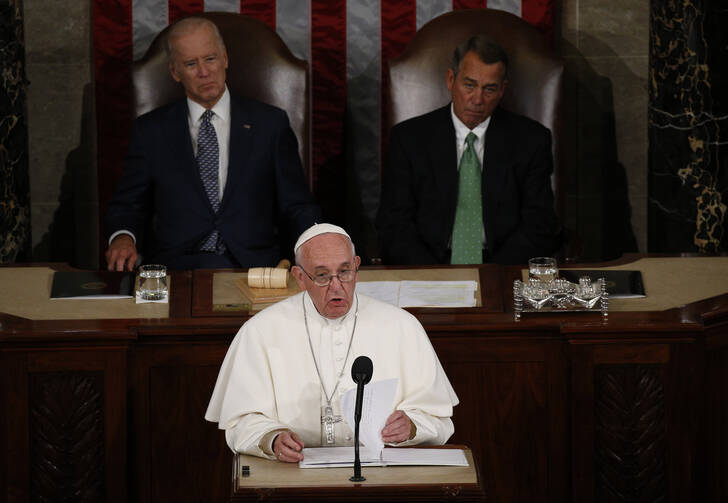 Pope Francis addresses a joint meeting of the U.S. Congress as Vice President Joe Biden (left) and Speaker of the House John Boehner look on in the House of Representatives Chamber at the U.S. Capitol in Washington Sept. 24. (CNS photo/Paul Haring) 