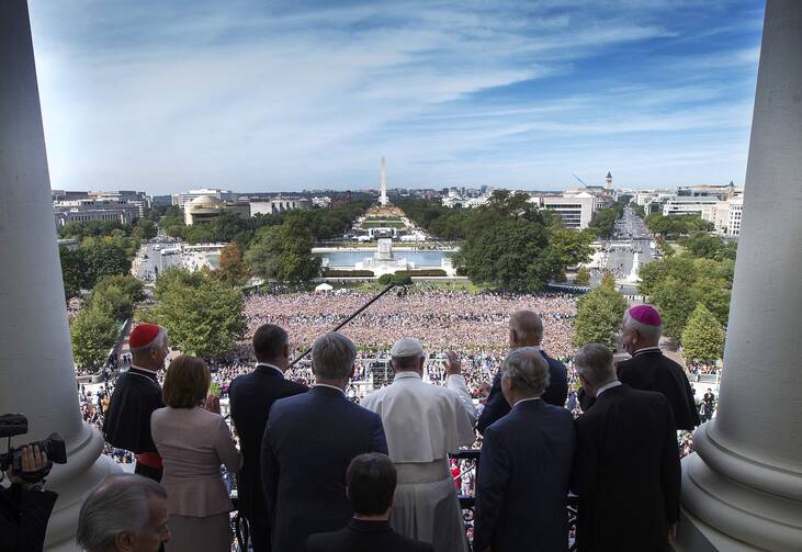 Pope Francis is welcomed to the Speakers Balcony at the U.S. Capitol by members of Congress Sept. 24. (CNS photo/Doug Mills, pool) 