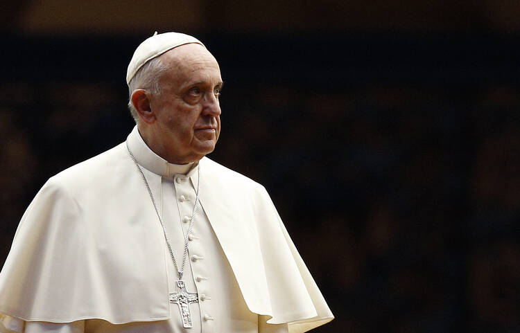 Pope Francis arrives for a prayer vigil for the Synod of Bishops on the family in St. Peter's Square at the Vatican Oct. 3. (CNS/Paul Haring) 