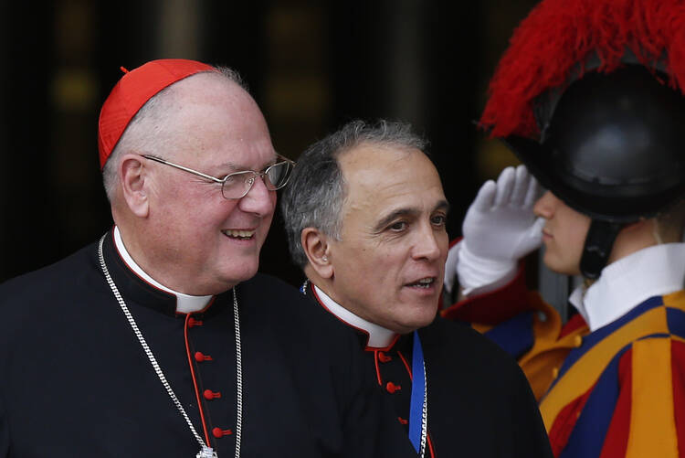 Cardinals Dolan and DiNardo leave opening session of Synod of Bishops on the family at Vatican