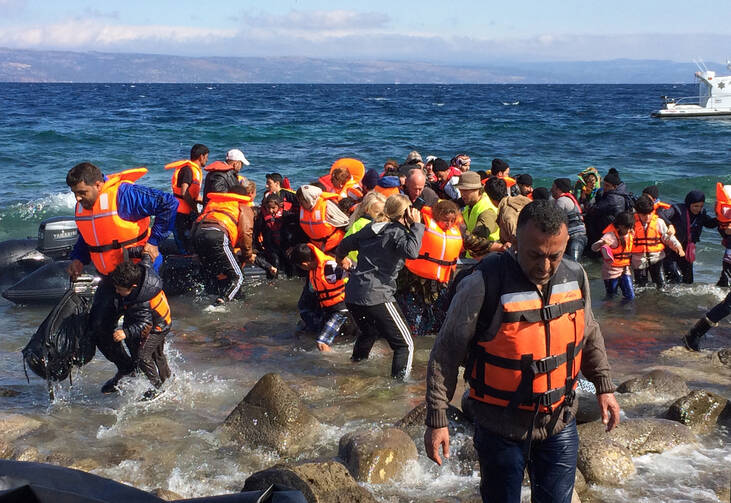 Migrants from Syria arrive on the Greek island of Lesbos Oct. 2 after crossing the Aegean Sea from Turkey. (CNS photo/Dale Gavlak) 