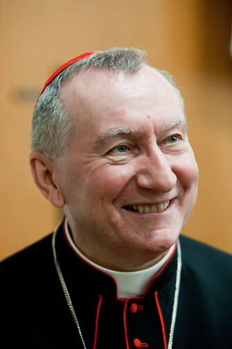 Cardinal Pietro Parolin, Vatican secretary of state, smiles as he attends a conference commemorating the 50th anniversary of the Second Vatican Council's document, "Nostra Aetate." (CNS photo/M. Migliorato, Catholic Press Photo)