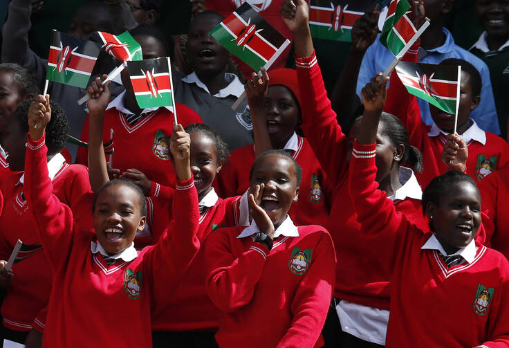 Students cheer as they wait for Pope Francis' arrival to meet with youths at Kasarani Stadium in Nairobi, Kenya, Nov. 27. (CNS photo/Paul Haring) 