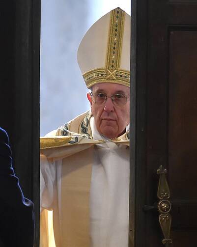 Pope Francis opens the Holy Door of St. Peter's Basilica to inaugurate the Jubilee Year of Mercy at the Vatican Dec. 8. (CNS photo/Ettore Ferrari, EPA) 