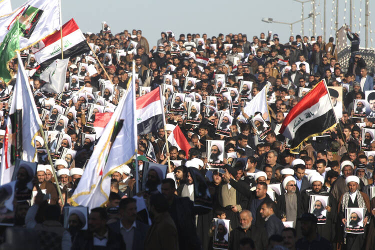 Supporters of Muqtada al-Sadr, a Shiite Muslim cleric, protest the execution of Sheik Nimr al-Nimr in Saudi Arabia during a demonstration in Najaf, Iraq, Jan. 4. (CNS photo/Alaa Al-Marjani, Reuters)