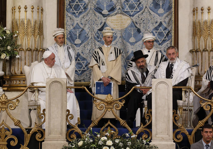 Pope Francis visits the main synagogue in Rome Jan. 17. Also seated is Rabbi Riccardo Di Segni, the chief rabbi of Rome, right. (CNS photo/Paul Haring) 