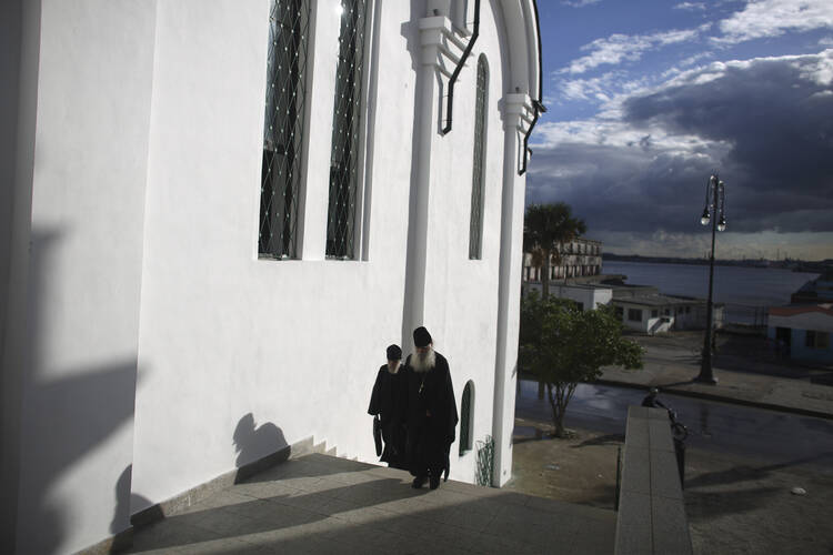 Orthodox priests arrive at the Russian Orthodox church in Havana Feb. 7. Pope Francis and Russian Orthodox Patriarch Kirill will meet in Cuba on Feb. 12. (CNS photo/Alexandre Meneghini, Reuters)