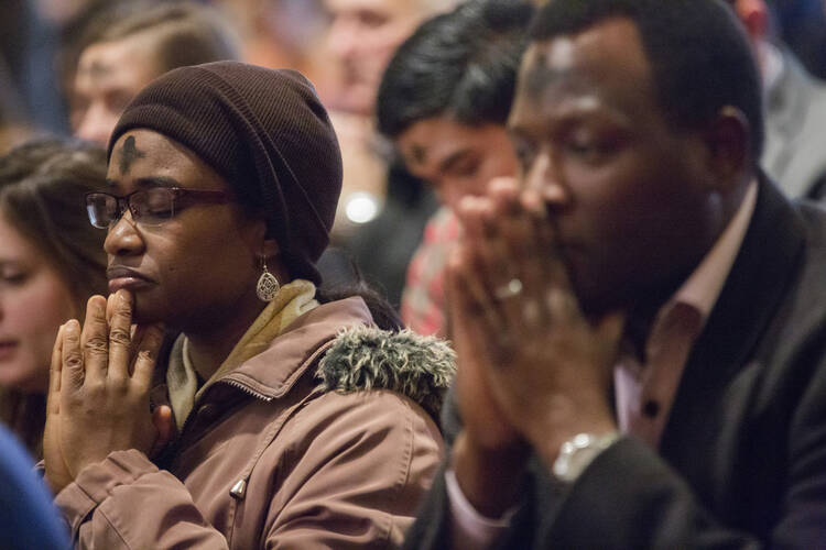 People pray during Ash Wednesday Mass Feb. 10, 2016 at the Cathedral of St. Matthew the Apostle in Washington. (CNS photo/Jaclyn Lippelmann, Catholic Standard)