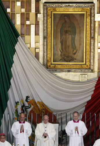 The original image of Our Lady of Guadalupe is seen as Pope Francis celebrates Mass in the Basilica of Our Lady of Guadalupe in Mexico City Feb. 13. (CNS photo/Paul Haring)