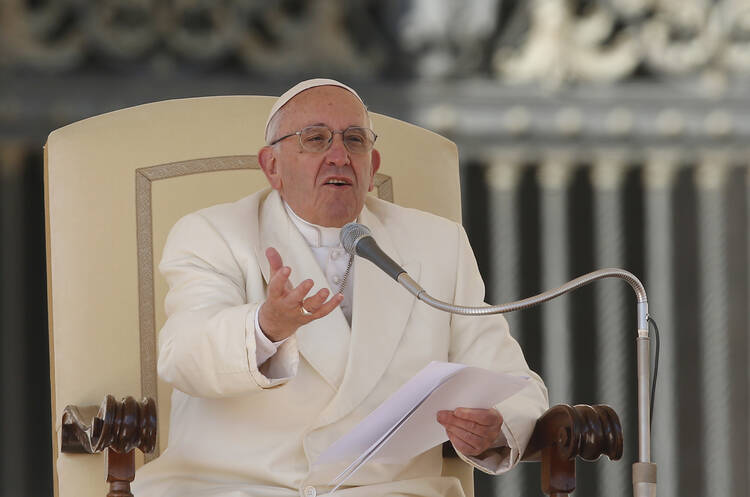 Pope Francis speaks during his general audience in St. Peter's Square at the Vatican March 2. (CNS photo/Paul Haring)