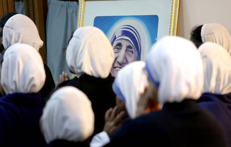 Women religious celebrate Mass in front of the tomb of Blessed Teresa of Kolkata in this Dec. 18, 2015, file photo from India. (CNS photo/Piyal Adhikary, EPA)