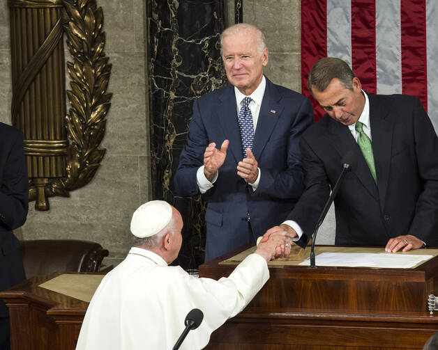 Zip-a-dee-doo-dah Day. U.S. Vice President Joe Biden and then-House Speaker John Boehner greet Pope Francis in Washington in this Sept. 24, 2015, file photo. (CNS photo/Drew Angerer, EPA) 