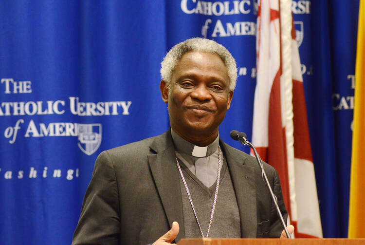 Ghanaian Cardinal Peter Turkson, president of the Pontifical Council for Justice and Peace, is seen in Washington March 17 on the campus of The Catholic University of America. (CNS photo/courtesy The Catholic University of America) 