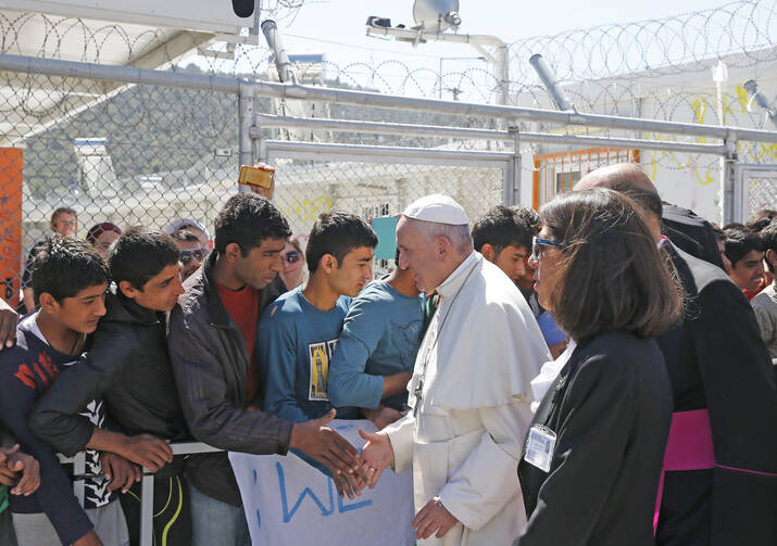 Pope Francis meets refugees at the Moria refugee camp on the island of Lesbos, Greece, April 16, 2016. (CNS photo/Paul Haring)