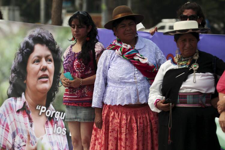 Women participate in an April 26 memorial service in San Salvador, El Salvador, for murdered environmental rights activist Berta Caceres Flores. (CNS photo/Jorge Cabrera, Reuters) 