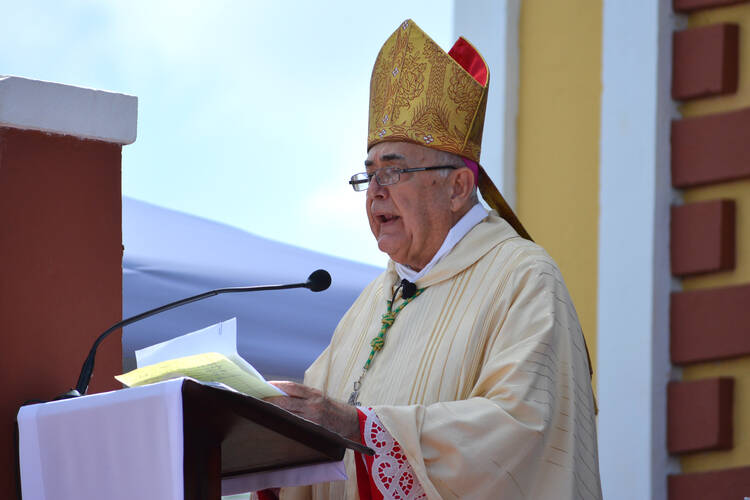 Bishop Alvaro Corrada del Rio of Mayaguez, Puerto Rico, celebrates mass on May 22 in Sabana Grande. The bishop immediately removed then-Father Floyd McCoy Jordan from his post after the first complaint of lewd actions. (CNS photo/Wallice J. de la Vega) 
