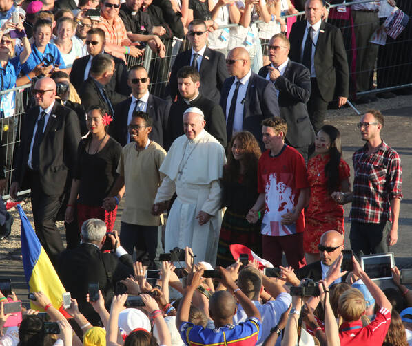 Pope Francis arrives for a prayer vigil with World Youth Day pilgrims at the Field of Mercy in Krakow, Poland in 2016. (CNS photo/Bob Roller