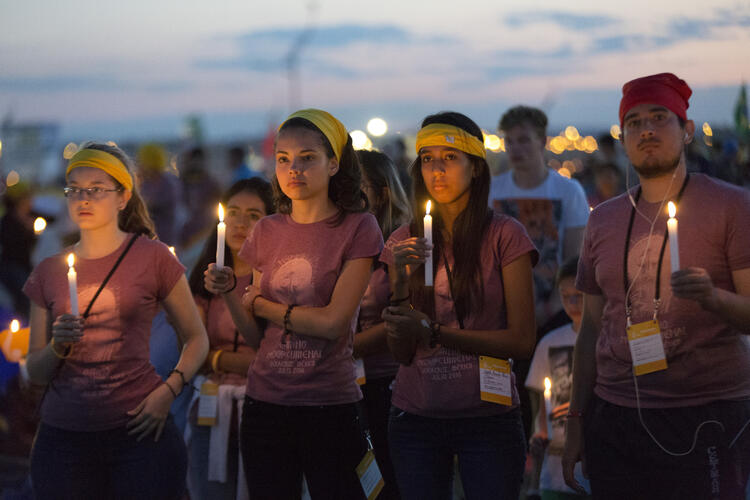 Some Practices Prove Sticky. World Youth Day pilgrims hold candles during eucharistic adoration with Pope Francis at the July 30 prayer vigil at the Field of Mercy in Krakow, Poland. (CNS photo/Jaclyn Lippelmann, Catholic Standard)