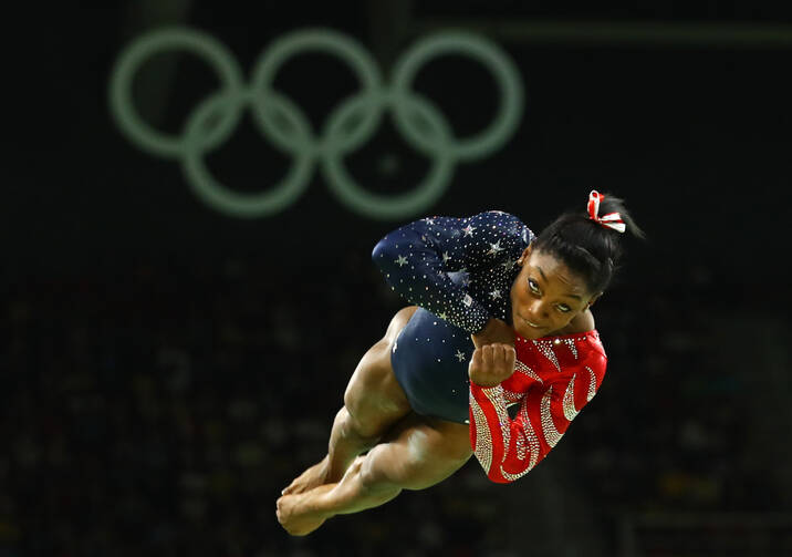 U.S. gymnast Simone Biles, a Catholic, competes on the floor exercise during the Summer Olympics in Rio de Janeiro Aug. 7. (CNS photo/Mike Blake, Reuters)