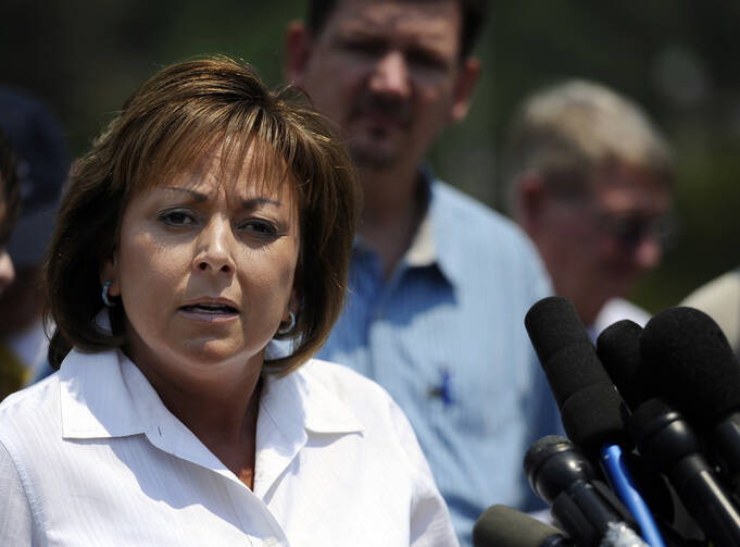 New Mexico Gov. Susana Martinez is seen in Los Alamos, N.M., in this 2011 file photo. New Mexico's Catholic bishops renounce her call to reinstate the death penalty. 