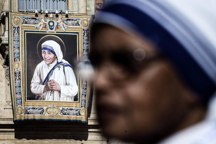 A tapestry depicting St. Teresa of Kolkata is seen in St. Peter's Square at the Vatican Sept. 4. (CNS photo/Angelo Carconi, EPA)