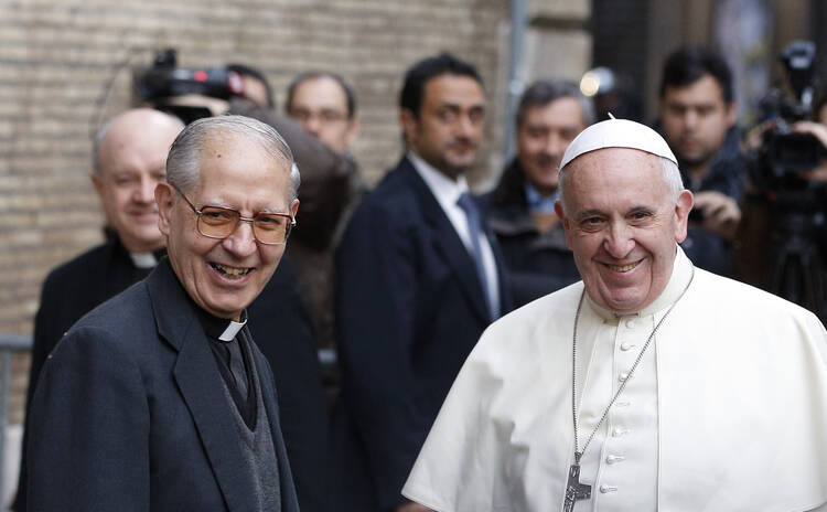 Father Adolfo Nicolas, superior general of the Society of Jesus, and Pope Francis, meet before celebrating Mass at the Church of the Gesu in Rome in this Jan. 3, 2014, file photo. (CNS photo/Paul Haring)