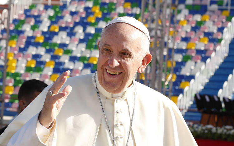 Peacekeeping Mission. Pope Francis greets the crowd before celebrating Mass at Mikheil Meskhi Stadium in Tbilisi, Georgia, on Oct. 1. (CNS photo/Paul Haring)