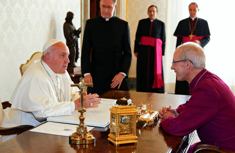 Pope Francis meets Anglican Archbishop Justin Welby of Canterbury, England, spiritual leader of the Anglican Communion, at the Vatican Oct. 6. (CNS photo/Tony Gentile, Reuters)